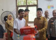 Bupati Dedi Irawan Serahkan Bantuan ke Warga Terdampak Banjir Bangkunat