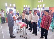 HASANI Lantik Tiga Aparatur Kampung Bandar Dalam, Tekankan Efisiensi Anggaran dan Pelayanan Prima